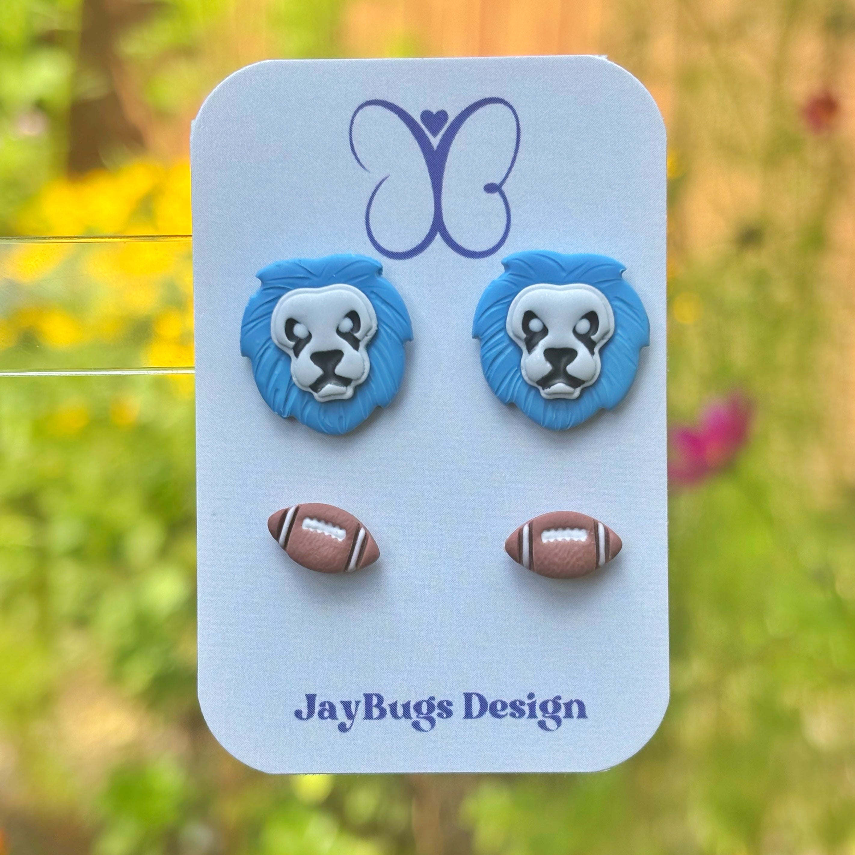 Lion Heads & Football Stud Duo